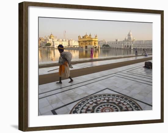 Elderly Sikh Pilgrim with Bundle and Stick Walking Around Holy Pool, Amritsar, India-Eitan Simanor-Framed Photographic Print