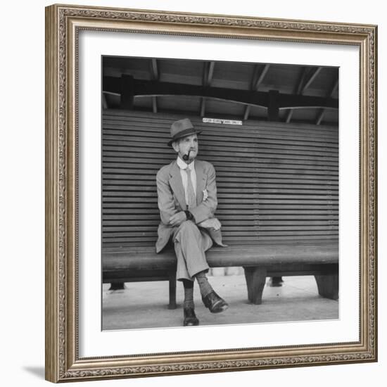 Elderly White South African Smoking Pipe Alone on Bench with Sign Noting, For Europeans Only-Nat Farbman-Framed Photographic Print