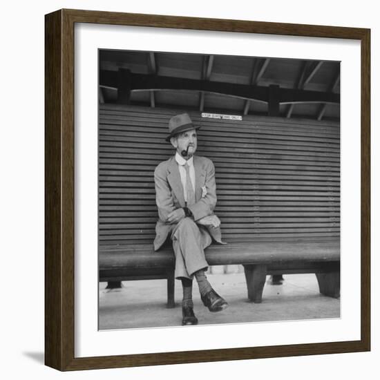 Elderly White South African Smoking Pipe Alone on Bench with Sign Noting, For Europeans Only-Nat Farbman-Framed Photographic Print