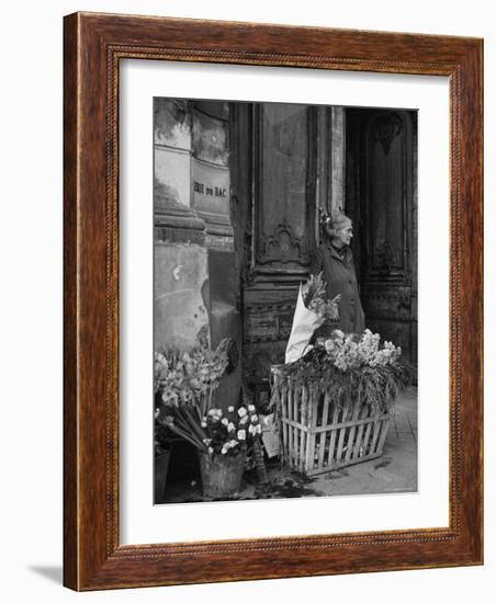 Elderly Woman Selling Flowers Outside Gallerie du Bac, Paris-Gjon Mili-Framed Photographic Print