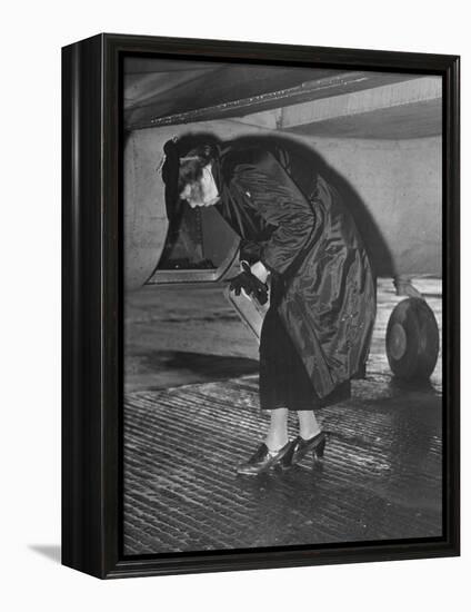 Eleanor Roosevelt Examining Rear Turret-Gunner's Compartment under the Tail Assembly of US Bomber-null-Framed Premier Image Canvas