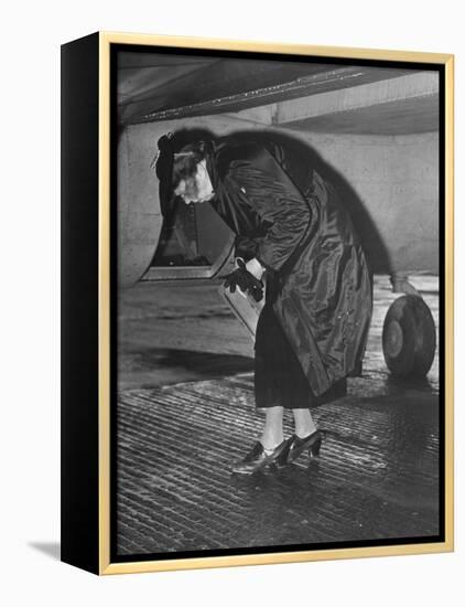 Eleanor Roosevelt Examining Rear Turret-Gunner's Compartment under the Tail Assembly of US Bomber-null-Framed Premier Image Canvas