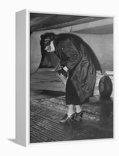 Eleanor Roosevelt Examining Rear Turret-Gunner's Compartment under the Tail Assembly of US Bomber-null-Framed Premier Image Canvas