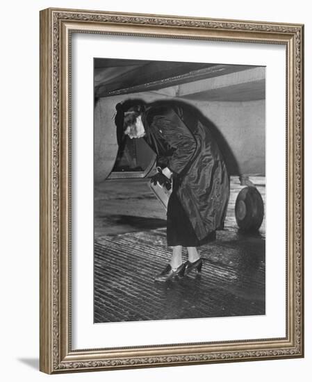 Eleanor Roosevelt Examining Rear Turret-Gunner's Compartment under the Tail Assembly of US Bomber-null-Framed Photographic Print