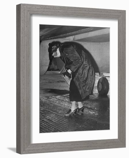 Eleanor Roosevelt Examining Rear Turret-Gunner's Compartment under the Tail Assembly of US Bomber-null-Framed Photographic Print