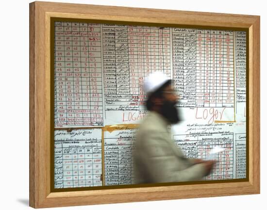 Electoral Worker Passes Election Results Posted on Wall at a Counting Center in Kabul, Afghanistan-null-Framed Premier Image Canvas