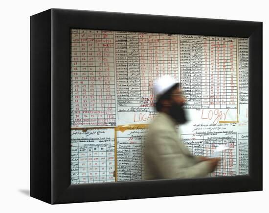 Electoral Worker Passes Election Results Posted on Wall at a Counting Center in Kabul, Afghanistan-null-Framed Premier Image Canvas