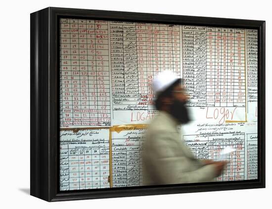 Electoral Worker Passes Election Results Posted on Wall at a Counting Center in Kabul, Afghanistan-null-Framed Premier Image Canvas