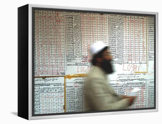 Electoral Worker Passes Election Results Posted on Wall at a Counting Center in Kabul, Afghanistan-null-Framed Premier Image Canvas