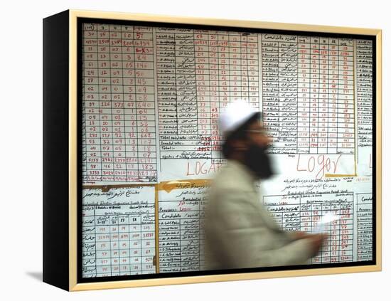 Electoral Worker Passes Election Results Posted on Wall at a Counting Center in Kabul, Afghanistan-null-Framed Premier Image Canvas