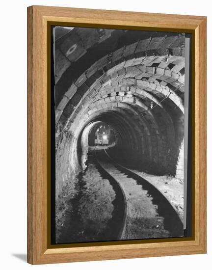 Electric Locomotive on Track in Powderly Anthracite Coal Mine Gangway, Owned by Hudson Coal Co-Margaret Bourke-White-Framed Premier Image Canvas