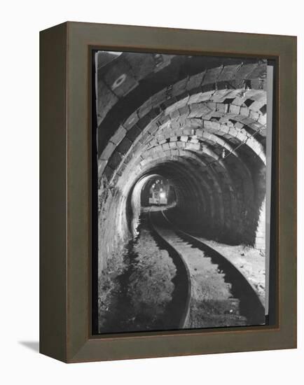 Electric Locomotive on Track in Powderly Anthracite Coal Mine Gangway, Owned by Hudson Coal Co-Margaret Bourke-White-Framed Premier Image Canvas