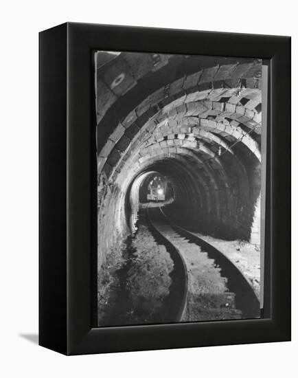 Electric Locomotive on Track in Powderly Anthracite Coal Mine Gangway, Owned by Hudson Coal Co-Margaret Bourke-White-Framed Premier Image Canvas