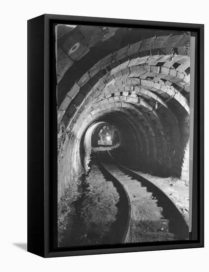 Electric Locomotive on Track in Powderly Anthracite Coal Mine Gangway, Owned by Hudson Coal Co-Margaret Bourke-White-Framed Premier Image Canvas