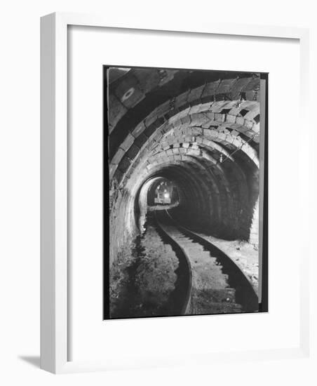 Electric Locomotive on Track in Powderly Anthracite Coal Mine Gangway, Owned by Hudson Coal Co-Margaret Bourke-White-Framed Premium Photographic Print