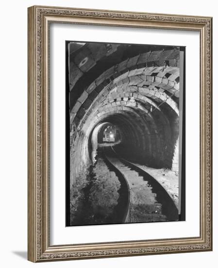 Electric Locomotive on Track in Powderly Anthracite Coal Mine Gangway, Owned by Hudson Coal Co-Margaret Bourke-White-Framed Photographic Print