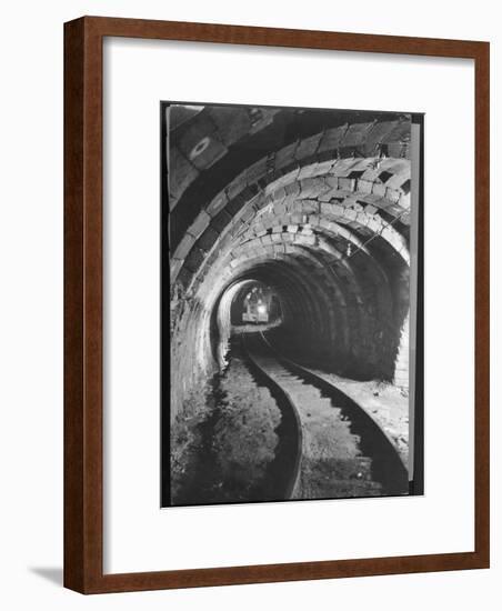 Electric Locomotive on Track in Powderly Anthracite Coal Mine Gangway, Owned by Hudson Coal Co-Margaret Bourke-White-Framed Photographic Print