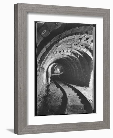 Electric Locomotive on Track in Powderly Anthracite Coal Mine Gangway, Owned by Hudson Coal Co-Margaret Bourke-White-Framed Photographic Print