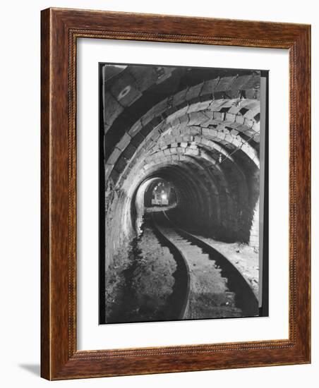 Electric Locomotive on Track in Powderly Anthracite Coal Mine Gangway, Owned by Hudson Coal Co-Margaret Bourke-White-Framed Photographic Print