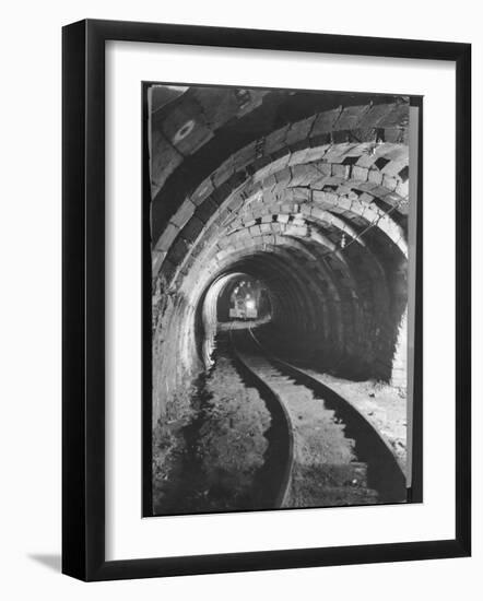 Electric Locomotive on Track in Powderly Anthracite Coal Mine Gangway, Owned by Hudson Coal Co-Margaret Bourke-White-Framed Photographic Print