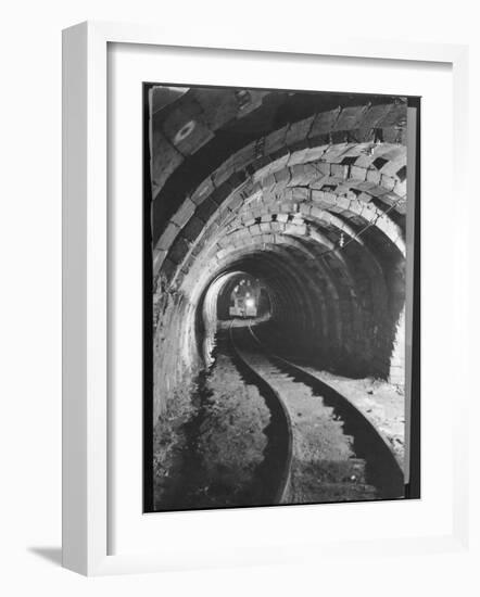 Electric Locomotive on Track in Powderly Anthracite Coal Mine Gangway, Owned by Hudson Coal Co-Margaret Bourke-White-Framed Photographic Print