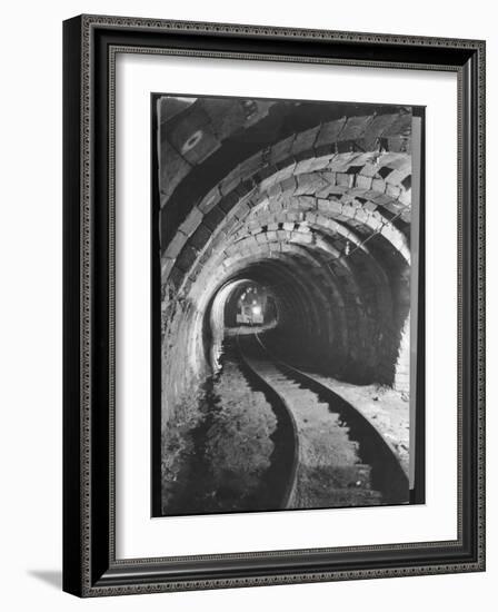 Electric Locomotive on Track in Powderly Anthracite Coal Mine Gangway, Owned by Hudson Coal Co-Margaret Bourke-White-Framed Photographic Print