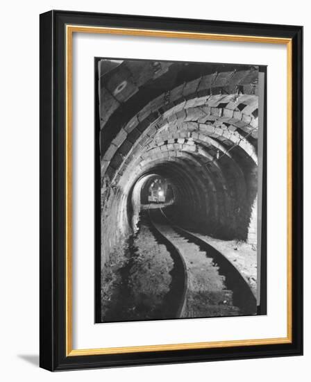 Electric Locomotive on Track in Powderly Anthracite Coal Mine Gangway, Owned by Hudson Coal Co-Margaret Bourke-White-Framed Photographic Print