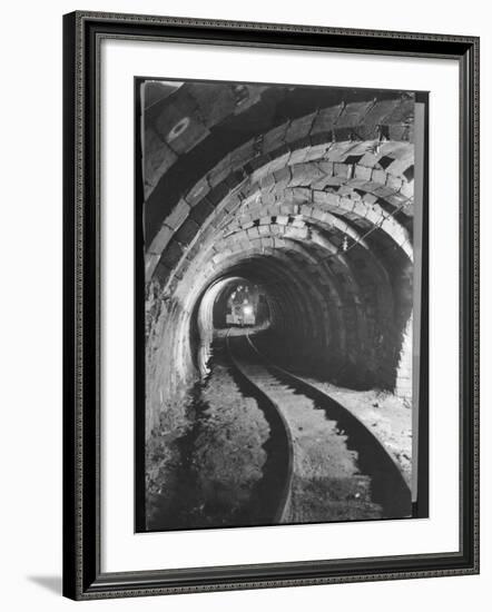 Electric Locomotive on Track in Powderly Anthracite Coal Mine Gangway, Owned by Hudson Coal Co-Margaret Bourke-White-Framed Photographic Print