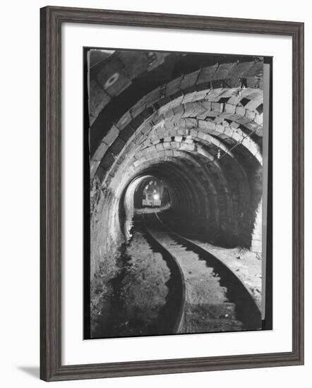 Electric Locomotive on Track in Powderly Anthracite Coal Mine Gangway, Owned by Hudson Coal Co-Margaret Bourke-White-Framed Photographic Print