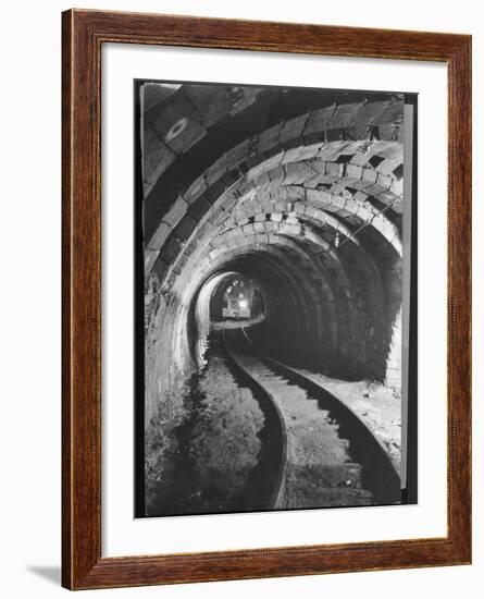 Electric Locomotive on Track in Powderly Anthracite Coal Mine Gangway, Owned by Hudson Coal Co-Margaret Bourke-White-Framed Photographic Print