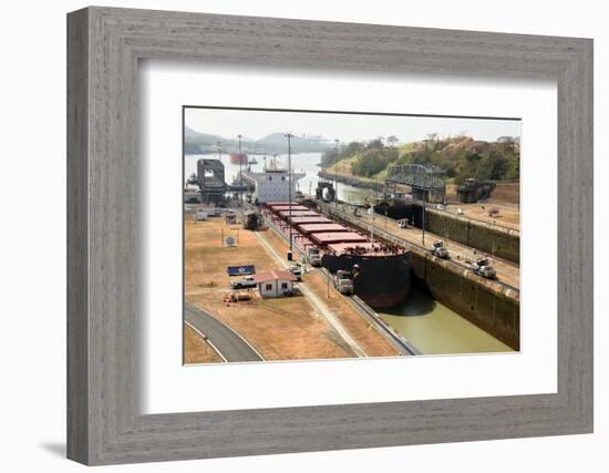 Electric mules guiding Panamax ship through Miraflores Locks on the Panama Canal, Panama, Central A-Tony Waltham-Framed Photographic Print