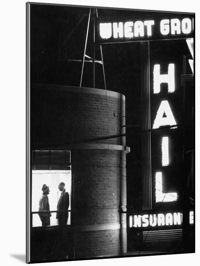 Electric Sign Outside Office of Insurance Co.-Howard Sochurek-Mounted Photographic Print