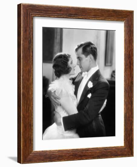 Elegant Couple Holding and Looking at Each Other-null-Framed Photo