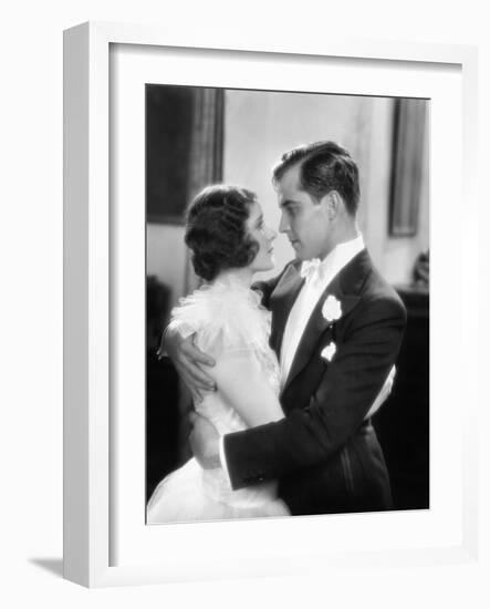 Elegant Couple Holding and Looking at Each Other-null-Framed Photo