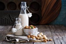 Almond Nut Vegan Milk Non Dairy in Different Bottles with Copy Space-Elena Veselova-Photographic Print