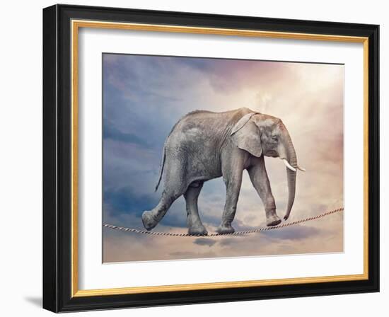 Elephant On A Tightrope-egal-Framed Art Print