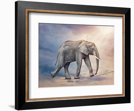 Elephant On A Tightrope-egal-Framed Art Print