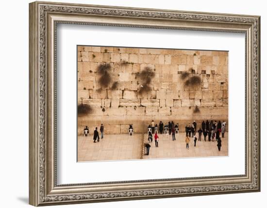 Elevated view of the Western Wall Plaza with people praying at the wailing wall, Jewish Quarter...-null-Framed Photographic Print