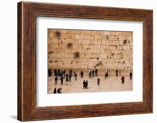 Elevated view of the Western Wall Plaza with people praying at the wailing wall, Jewish Quarter...-null-Framed Photographic Print