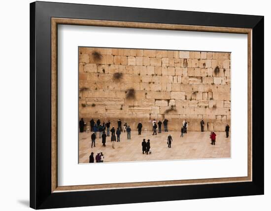 Elevated view of the Western Wall Plaza with people praying at the wailing wall, Jewish Quarter...-null-Framed Photographic Print