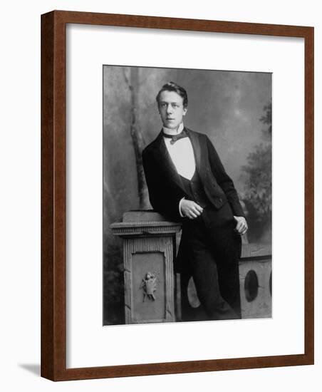 Elgant Young Man Posing for Studio Portrait Attired in Black Tie and Tails-null-Framed Photographic Print