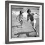 Elizabeth Liz Taylor and Roddy Mcdowall Playing on the Beach 1948-null-Framed Photo