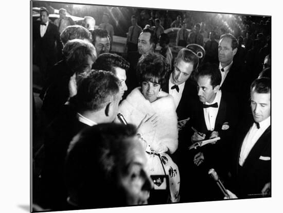 Elizabeth Taylor, After Winning an Oscar, in Crowd with Husband, Eddie Fisher-Grey Villet-Mounted Premium Photographic Print