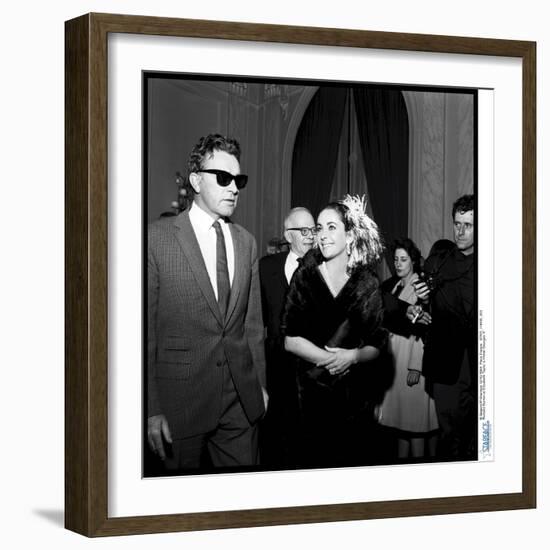 Elizabeth Taylor and Her Husband Richard Burton at a Party-Therese Begoin-Framed Photographic Print