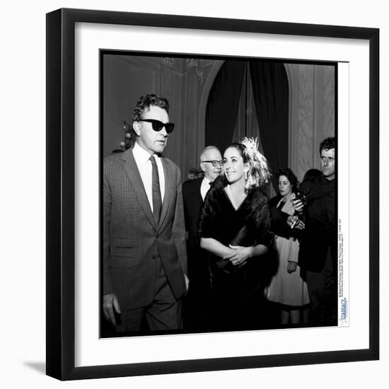 Elizabeth Taylor and Her Husband Richard Burton at a Party-Therese Begoin-Framed Photographic Print