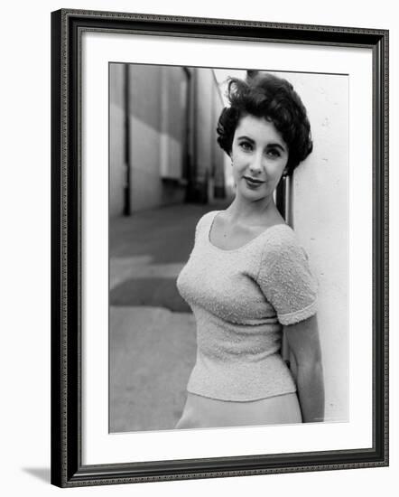 Elizabeth Taylor Outside of Sound Stages during Filming of A Place in the Sun-Peter Stackpole-Framed Premium Photographic Print