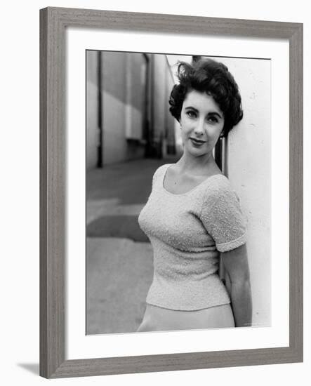 Elizabeth Taylor Outside of Sound Stages during Filming of A Place in the Sun-Peter Stackpole-Framed Premium Photographic Print