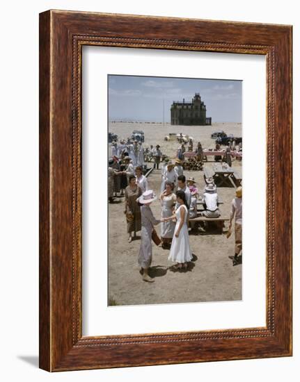 Elizabeth Taylor Shakes Hands with an Unidentified Woman on the Set of 'Giant', Marfa, Texas, 1956-Allan Grant-Framed Photographic Print