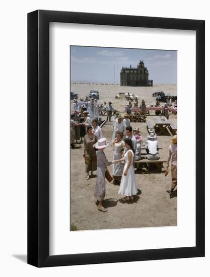 Elizabeth Taylor Shakes Hands with an Unidentified Woman on the Set of 'Giant', Marfa, Texas, 1956-Allan Grant-Framed Photographic Print