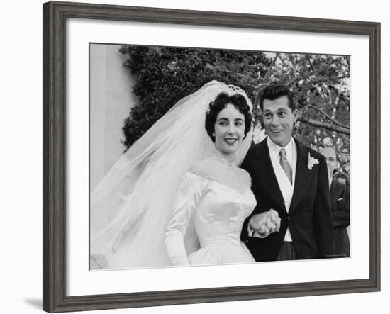 Elizabeth Taylor Wearing Beautiful Satin Wedding Gown with Husband Nicky Hilton Outside Church-Ed Clark-Framed Premium Photographic Print